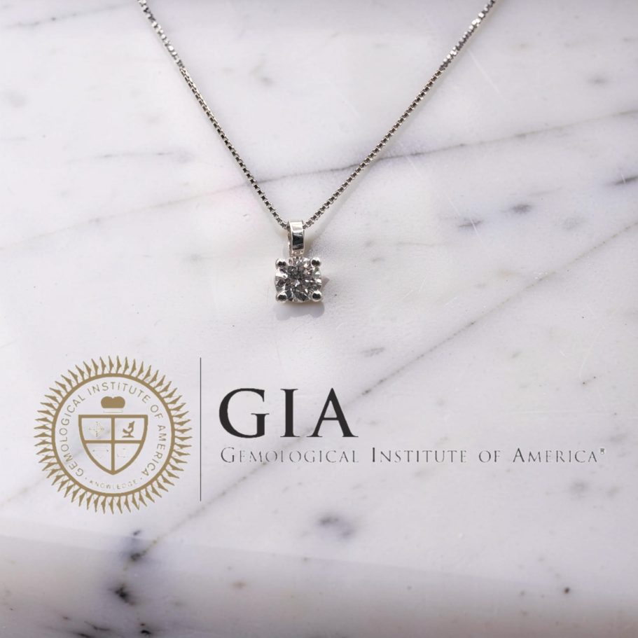 punto luce in oro bianco 18 Kt con diamante 0.30 carati D VS1 certificato GIA taglio brillante gioiello elegante